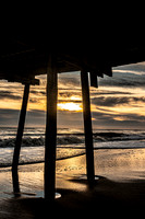 Golden Rays Under the Pier