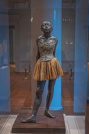 Elegance Cast in Metal: A Ballerina's Repose